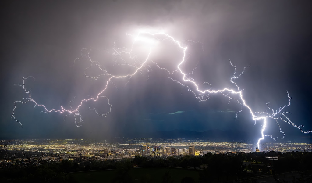 (Francisco Kjolseth | The Salt Lake Tribune) A massive lightning bolt strikes behind the Utah Capitol as an evening storm rolls into the Salt Lake Valley on Monday, Aug. 24. Recent monsoon rain hasn't boosted Utah's reservoirs.