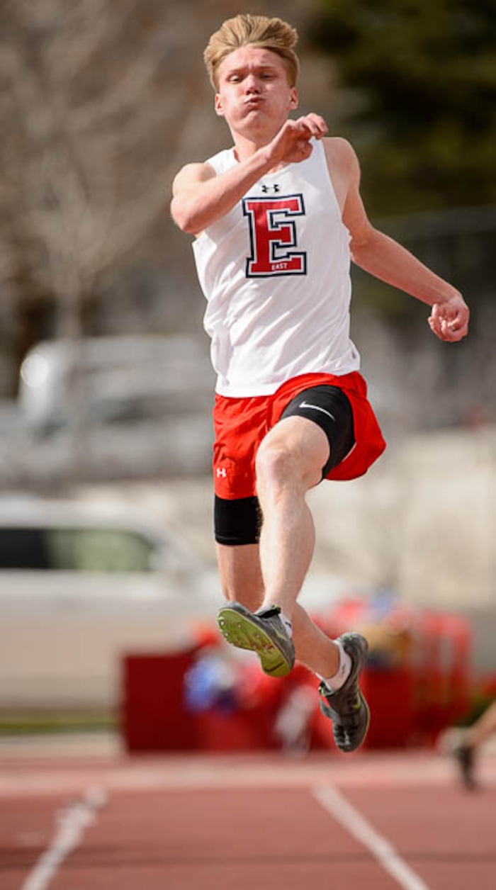 (Trent Nelson | The Salt Lake Tribune)  East track star Will Prettyman, one of the state's best long jumpers and sprinters, competing in the long jump, Thursday April 5, 2018.