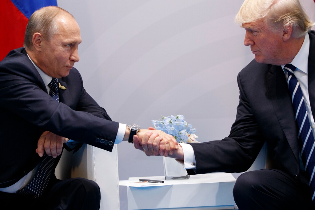 (Evan Vucci | AP file photo)

In this July 7, 2017, photo, President Donald Trump shakes hands with Russian President Vladimir Putin at the G20 Summit in Hamburg.