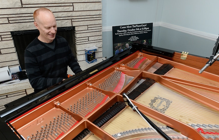 (Francisco Kjolseth | The Salt Lake Tribune) Pianist Jon Schmidt is constantly practicing as one of the four members of The Piano Guys musical group prepares for an upcoming show at the band's home studio in Sandy.