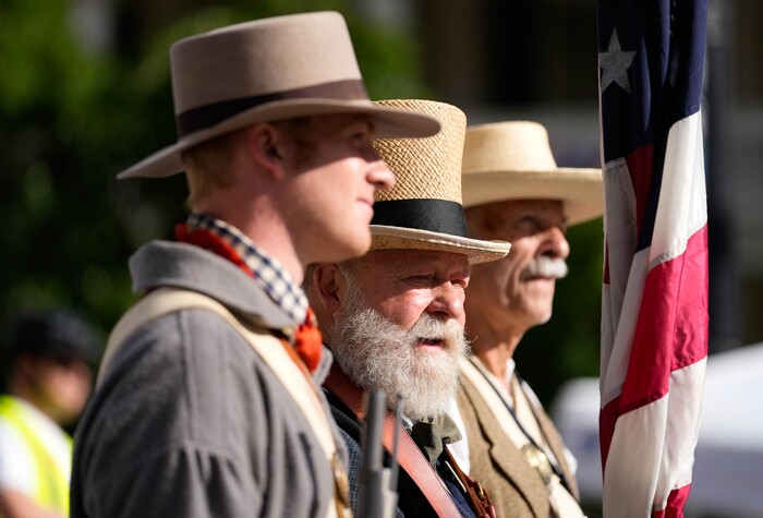 (Francisco Kjolseth | The Salt Lake Tribune) Members of the Mormon Battalion entry participate in the Days of ’47 Parade in Salt Lake City on Saturday, July 23, 2022.