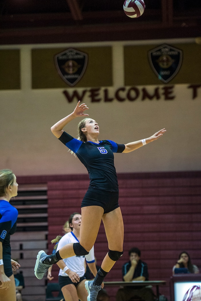 (Chris Detrick  |  The Salt Lake Tribune)  Pleasant Grove's Heather Gneiting (5) spikes the ball during the volleyball match at Lone Peak High School Tuesday, September 5, 2017. 