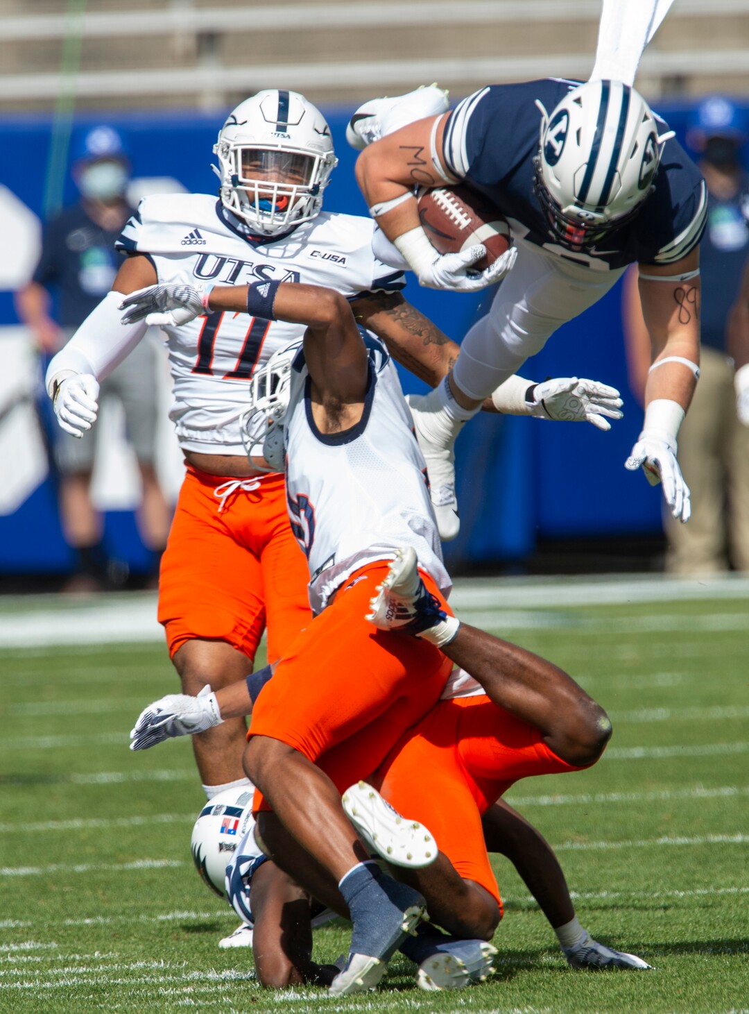 (Rick Egan  |  The Salt Lake Tribune)    Brigham Young Cougars tight end Masen Wake (13) leaps over the top of UTSA Roadrunners cornerback Corey Mayfield Jr. (26) in football action between the Brigham Young Cougars and the UTSA Roadrunners, at Lavell Edwards stadium, Saturday, Oct. 10, 2020.