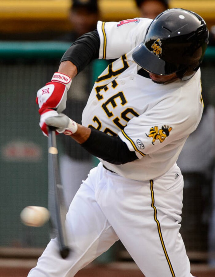 (Trent Nelson | The Salt Lake Tribune)  Salt Lake Bees vs. Albuquerque Isotopes, Triple-A baseball in Salt Lake City, Thursday April 5, 2018. Salt Lake's Ben Revere (25) hits a sacrifice fly in the second inning, allowing Jabari Blash to score.