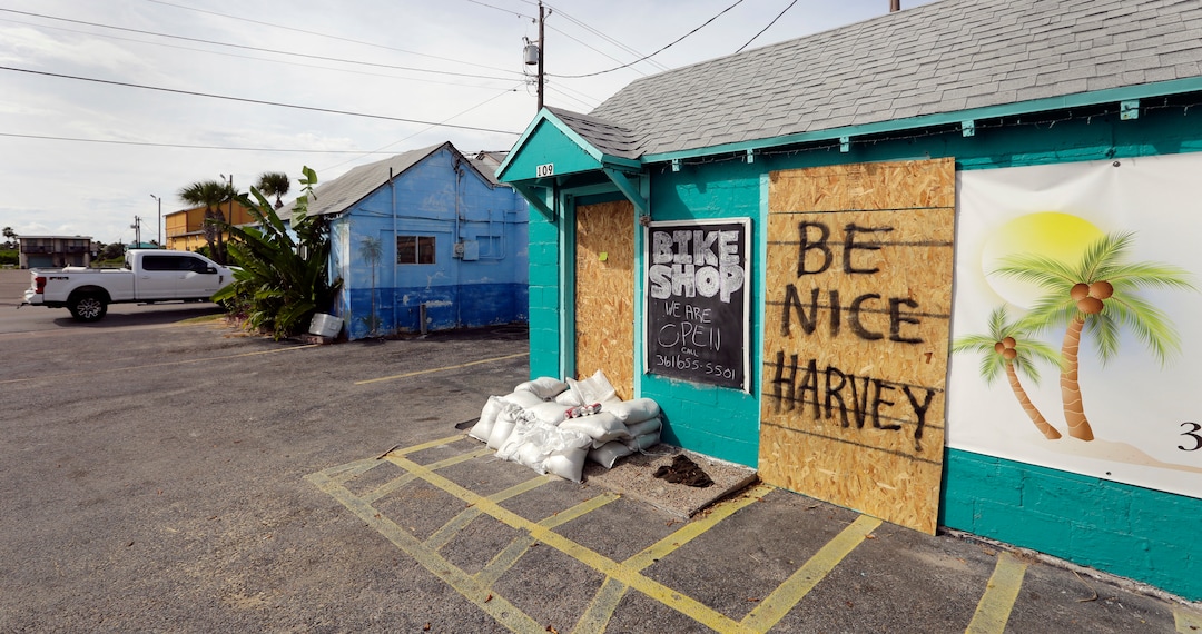 (Eric Gay | The Associated Press)  A sign reading "Be Nice Harvey" was left behind on a boarded up business, Thursday, Aug. 24, 2017, in Port Aransas, Texas. Port Aransas is under a mandatory evacuation for Hurricane Harvey. Harvey intensified into a hurricane Thursday and steered for the Texas coast.