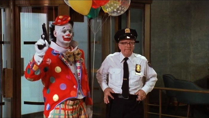( Courtesy photo) Grimm (Bill Murray, left, with Bob Elliot) dons a clown disguise to rob a bank in the 1990 heist comedy "Quick Change."