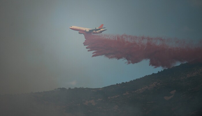 (Francisco Kjolseth  |  The Salt Lake Tribune)  Crews battle a grass fire in Tooele county being dubbed the Green Ravine fire as it burns on Tuesday, Sept. 3, 2019.