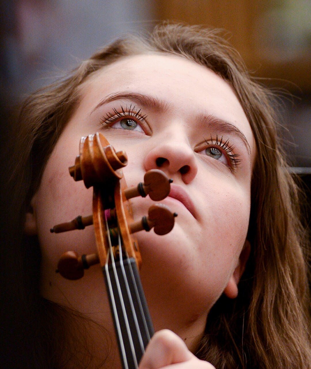 Leah Hogsten  |  The Salt Lake Tribune  Concert master violinist Betsy Metcalf listens to direction from Utah Symphony Music Director Thierry Fischer Thursday. Maestro Fischer is helping members of the Cottonwood High School symphony bring to life Stravinsky's "The Firebird‚" through the first Adopt a School pilot program. They will culminate in the performance of the piece on May 20, with Maestro Fischer conducting the live streamed event to other participating Utah orchestras who will be following along as the state's largest "Super Orchestra."