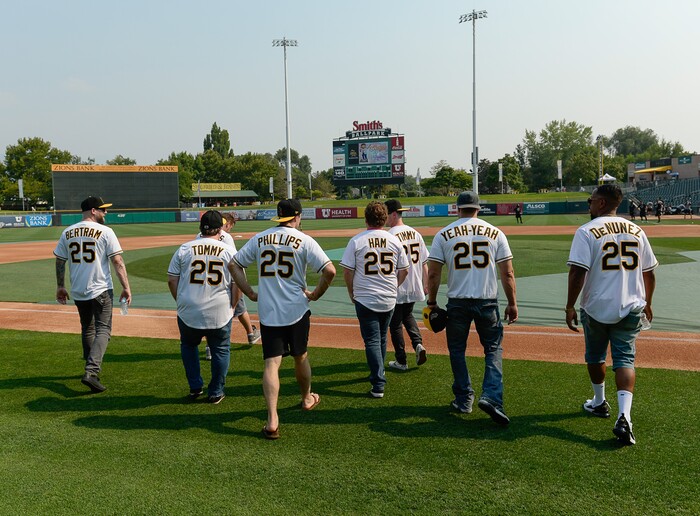 (Francisco Kjolseth  |  The Salt Lake Tribune)  The Salt Lake Bees celebrate the 25th anniversary of the Utah-filmed "The Sandlot" with members of the original cast at the Smith's Ballpark on Friday, Aug. 10, 2018, as they gather on the field while the Bees warm up for the night's game. 
