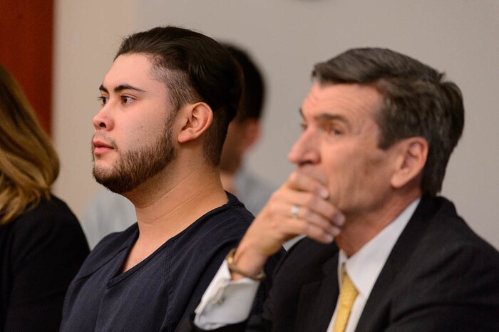 (Trent Nelson | The Salt Lake Tribune)  Abraham Miranda listens to statements from victims and their families at his sentencing in Salt Lake City, Thursday December 21, 2017. Miranda, 19, pleaded guilty to manslaughter counts for a February crash that killed two of his West High School classmates and critically injured a pregnant woman and her baby. At right is Miranda's attorney Greg Skordas.