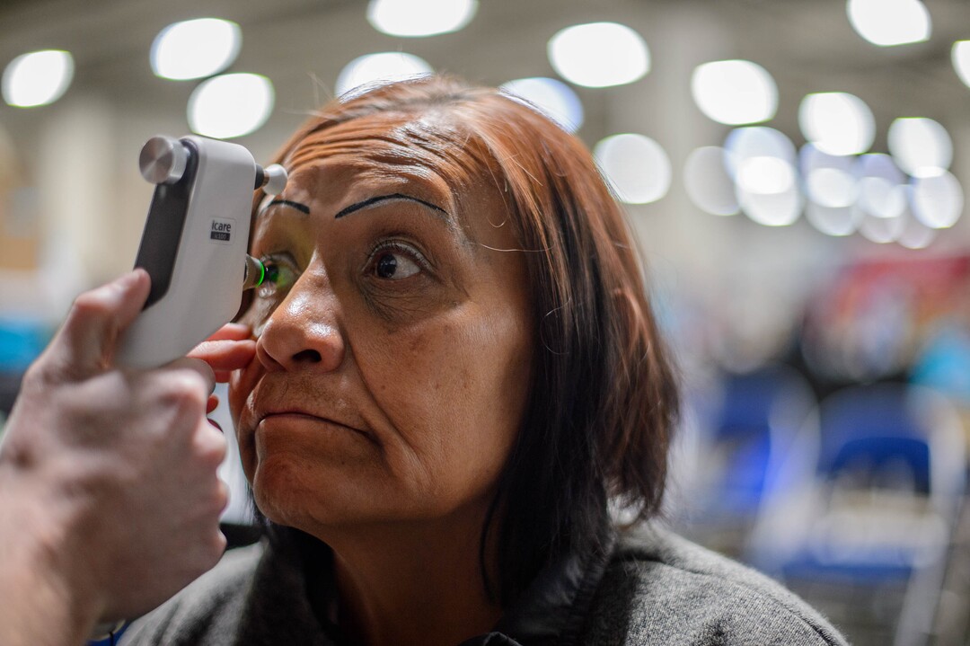 (Trent Nelson  |  The Salt Lake Tribune)Gloria Red Bear has an eye exam, leading to a free pair of glasses at Project Homeless Connect, where community volunteers to provide services for individuals and families experiencing homelessness, at the Salt Palace Convention Center in Salt Lake City on Friday Oct. 25, 2019.