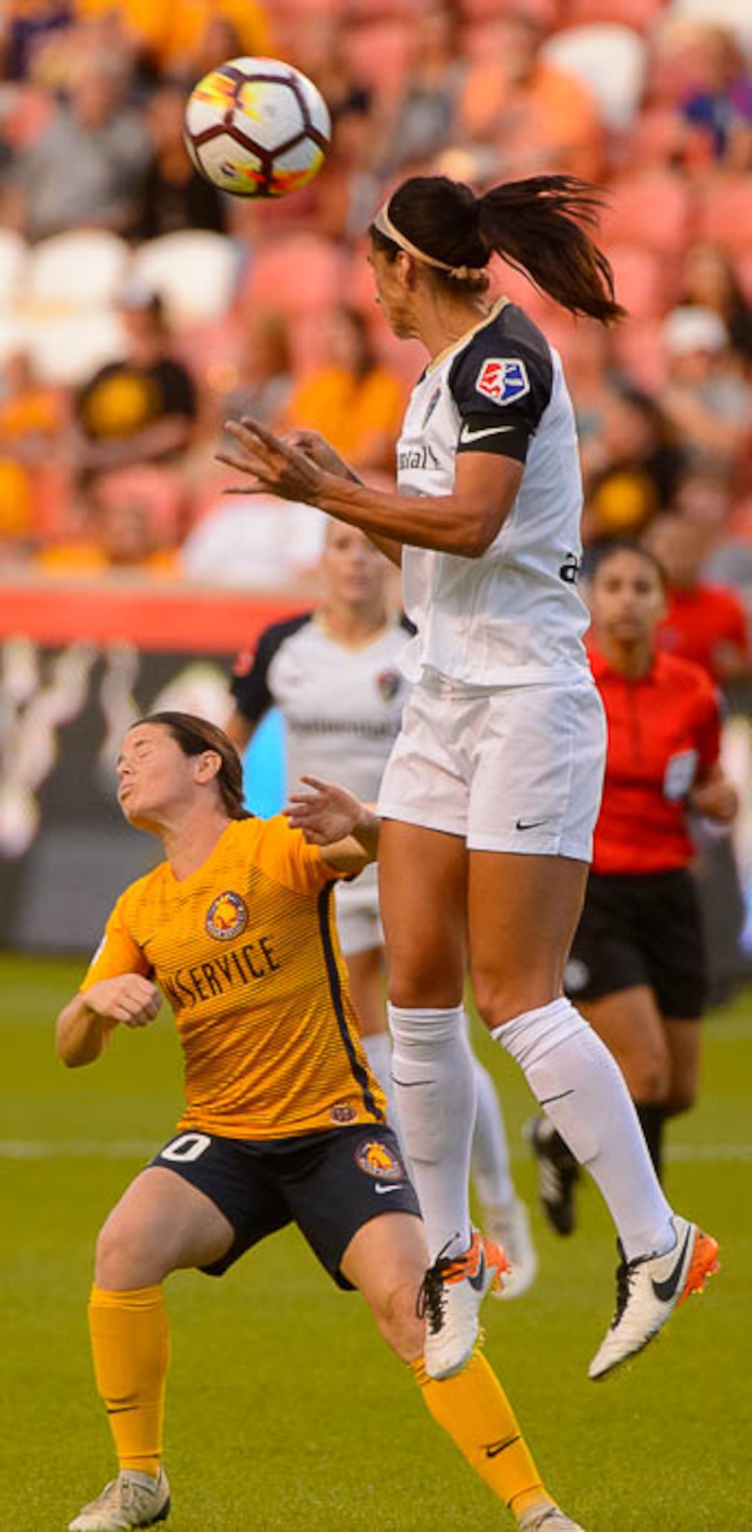 (Trent Nelson | The Salt Lake Tribune)  Utah Royals FC host North Carolina Courage, NWSL soccer at Rio Tinto Stadium in Sandy, Friday July 20, 2018. North Carolina Courage defender Abby Erceg (6) heads over Utah Royals FC midfielder Diana Matheson (10).