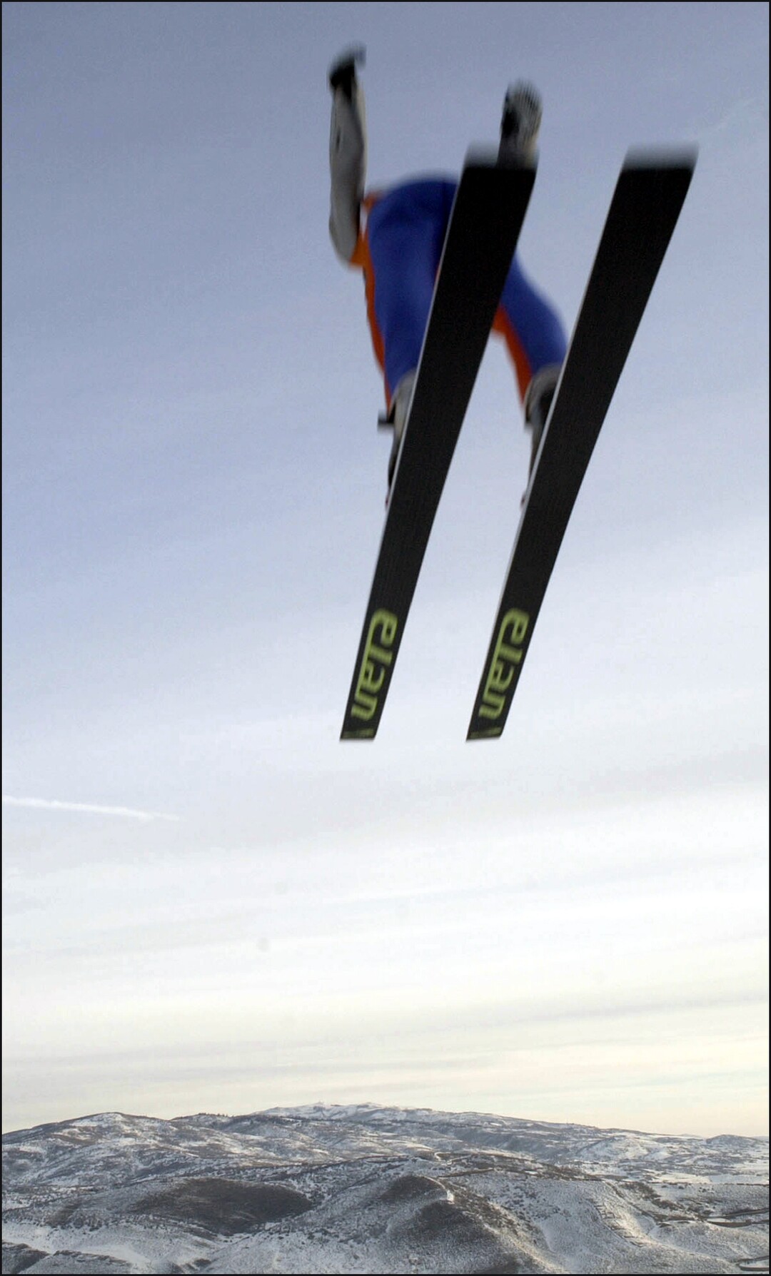 (Steve Griffin  |  Tribune file photo) A ski jumper sails through the air during the finals of the K120 ski jumping at the Utah Olympic Park in Park City during the 2002 Winter Games.
