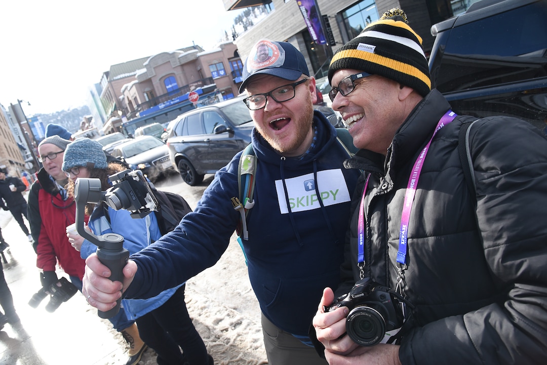 (Francisco Kjolseth  |  The Salt Lake Tribune)  Local big time celebrity fans Skippy Jessop, left, and Stuart Graves, take a moment to capture a selfie of themselves as the Sundance Film Festival kicks into high gear along Main street in Park City on Friday, Jan. 25, 2019, with fans hoping to snap a selfie with a celebrity, autograph seekers, paparazzi and locals.