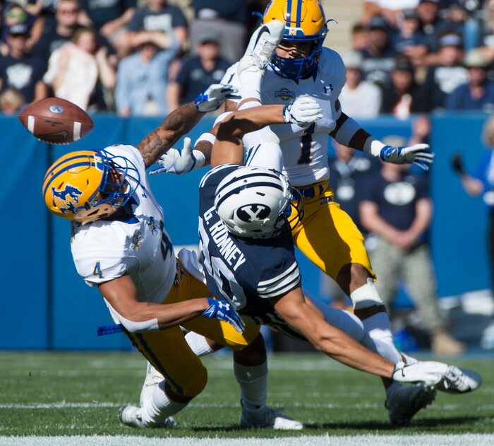 (Rick Egan  |  The Salt Lake Tribune)     McNeese State Cowboys defensive back Colby Burton (4) deflects a pass intended for Brigham Young Cougars wide receiver Gunner Romney (80), in football action between Brigham Young Cougars and McNeese State Cowboys, at Lavell Edwards Stadium, Saturday, Sept. 22, 2018.


