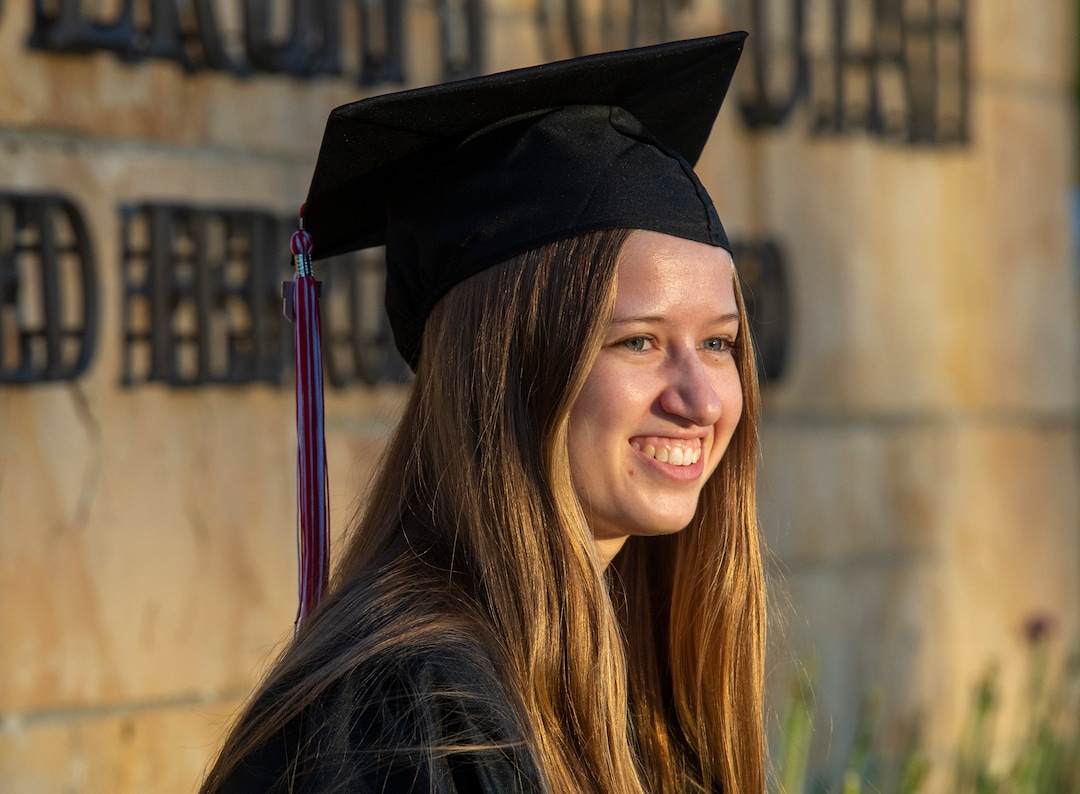 (Rick Egan  |  The Salt Lake Tribune)    Mindy Cook poses for a graduation photo at Presidents Circle at the University of Utah, Thursday April 30, 2020