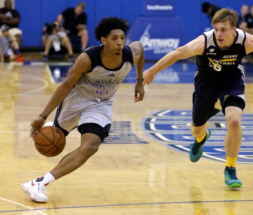 Oklahoma City Thunder's Cameron Payne (22) moves the ball past Indiana Pacers' Nate Wolters (6) during the second half of an NBA summer league basketball game, Wednesday, July 6, 2016, in Orlando, Fla. (AP Photo/John Raoux)