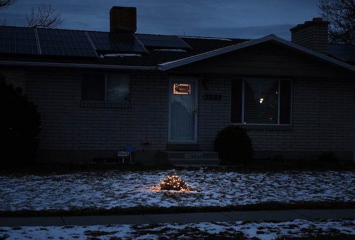 (Scott Sommerdorf | The Salt Lake Tribune)
One house on Royalwood Drive in Taylorsville took a more austere approach to Christmas lights, Friday, December 22, 2017. "Christmas Street" is a Taylorsville neighborhood where residents up and down the street decorate their homes every year with Christmas lights. The United States uses more electricity for Christmas lights than some countries use all year.