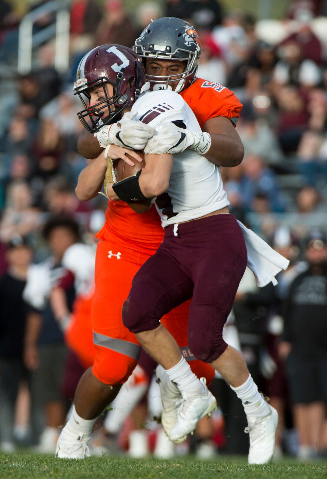 (Rick Egan  |  The Salt Lake Tribune)      Jordan defensive lineman, Stone Mulitalo brings down Jordan wide receiver, Ethan Bolingbroke (4) on a double reverse, in prep 5A playoff action between Jordan High and Skyridge High, in Lehi, Friday, Nov. 2, 2018.