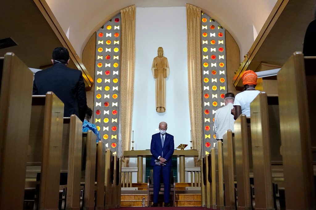 (Carolyn Kaster | AP) In this Thursday, Sept. 3, 2020 file photo, Democratic presidential candidate former Vice President Joe Biden bows his head in prayer at Grace Lutheran Church in Kenosha, Wis. Conservative evangelical Christians have proven some of Donald Trump’s staunchest allies during his presidency. As his administration draws to a close, some of those backers are approaching President-elect Biden with skepticism, but not antagonism.