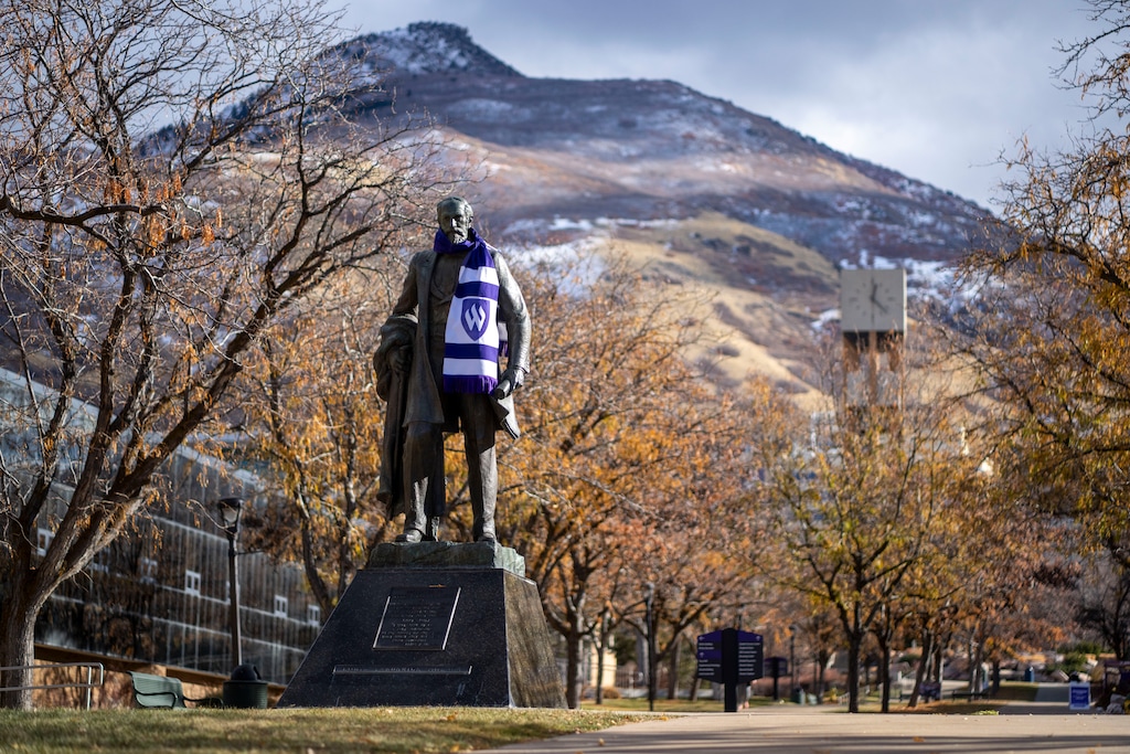(Rick Egan | The Salt Lake Tribune)  Louis Frederick Moench statue, and the Stewart Bell Tower, at Weber State University, on Tuesday, Dec 10, 2024.