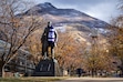 (Rick Egan | The Salt Lake Tribune)  Louis Frederick Moench statue, and the Stewart Bell Tower, at Weber State University, on Tuesday, Dec 10, 2024.


