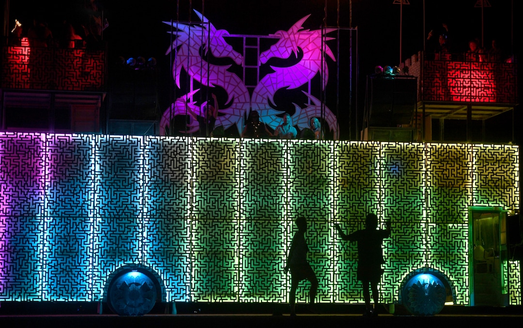 (Rick Egan  |  The Salt Lake Tribune)   Revelers dance to the music from an art car, at Burning Man, Friday day, Aug. 30, 2019.