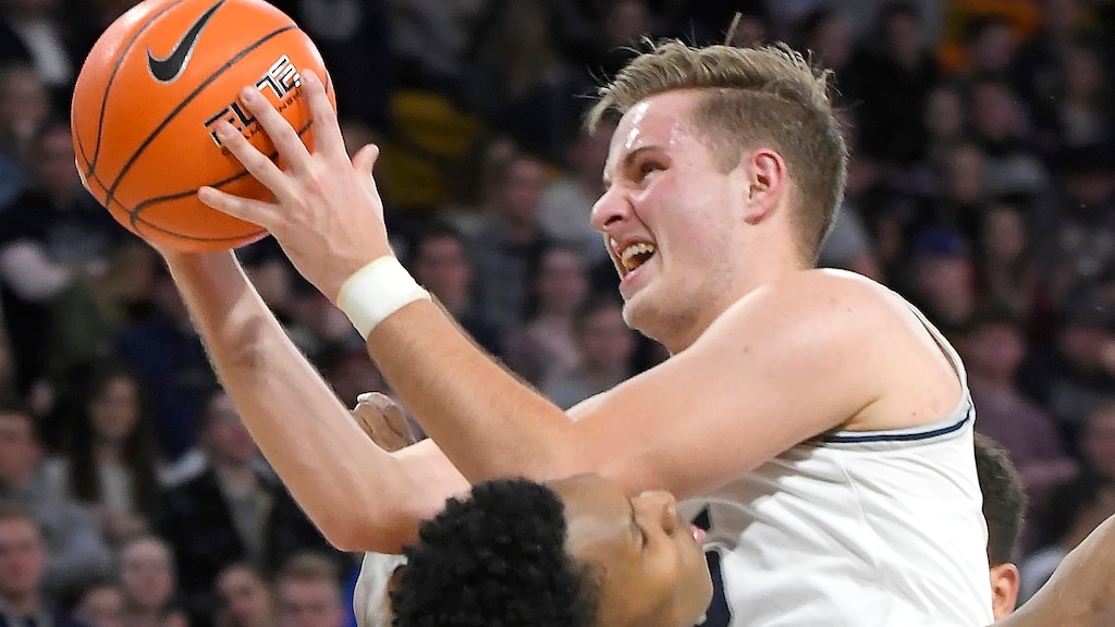 Utah State guard Sam Merrill, pictured during a recent victory over Air Force, scored 14 points to share game-high honors as the Aggies defeated the Wyoming Cowboys 68-45 on Tuesday, Jan. 28, 2020, in Laramie. (Eli Lucero/Herald Journal via AP)