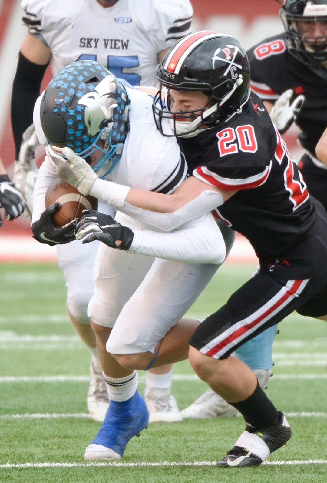 (Leah Hogsten  |  The Salt Lake Tribune)  Park CityÕs Kirby Baynes brings down Sky ViewÕs Mason Kalslev. Sky View High School defeated Park City 35-0 to win the 4A State Championship football title, Nov. 11, 2019 at Rice-Eccles Stadium.