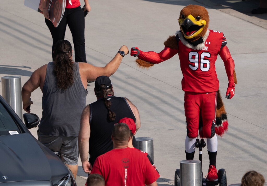 (Francisco Kjolseth | The Salt Lake Tribune) Swoop, the mascot, greets fans before the first football game of the season between the University of Utah and Weber State at Rice-Eccles Stadium on Thursday, Sept. 2, 2021.