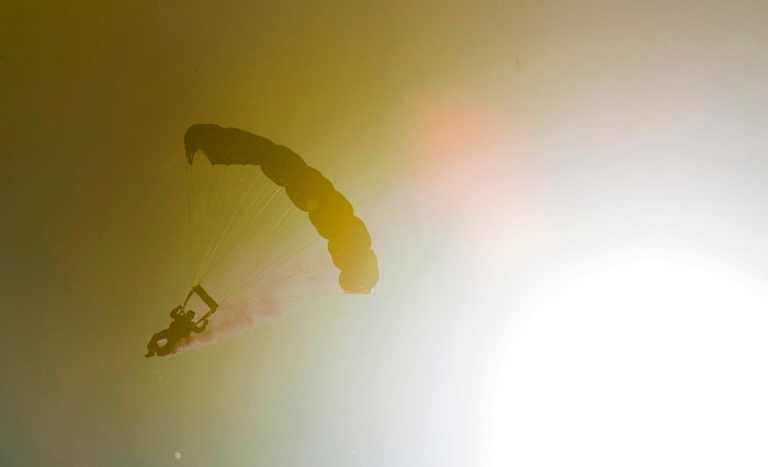 (Rick Egan  |  The Salt Lake Tribune)   A member of the The Para-Commandos Parachute Team performs at the opening of the Warriors Over the Wasatch airshow at Hill Airforce Base, Sunday, June 24, 2018.