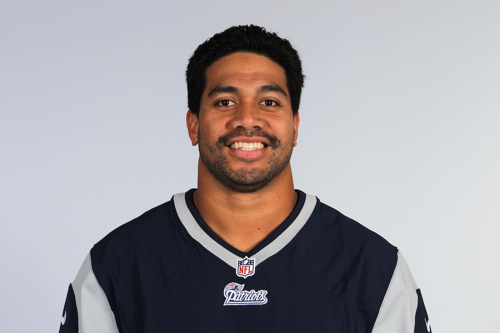 (AP file photo) This is a 2012 file photo of Jonathan Fanene of the New England Patriots NFL football team. Court filings allege former Cincinnati Bengals defensive end Jonathan Fanene faces charges used a pipe, golf club and broom handle to assault his wife and his sister over allegations he had an extramarital affair while on a trip to Hawaii. Fanene has been charged in the District Court of American Samoa with eight felonies, including kidnapping and assault, and five misdemeanors. He has been released on $100,000 bail and will appear in court next week.