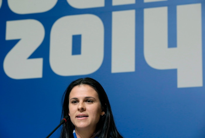 U.S. speedskater Brittany Bowe speaks during a 2014 Winter Olympics news conference, Thursday, Feb. 6, 2014, in Sochi, Russia. (AP Photo/Patrick Semansky)