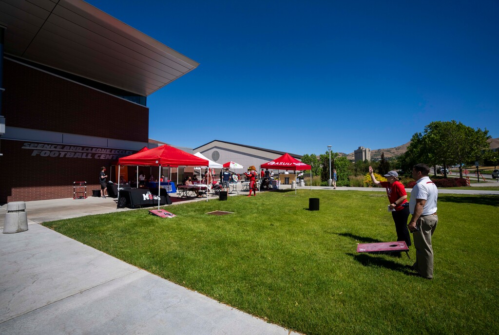 (Rick Egan | The Salt Lake Tribune) Games and booths are set up creating a party atmosphere at the Spence and Cleone Eccles Football Center for those getting the COVID-19 at the vaccination clinic at the University of Utah, Tuesday, June 29, 2021.