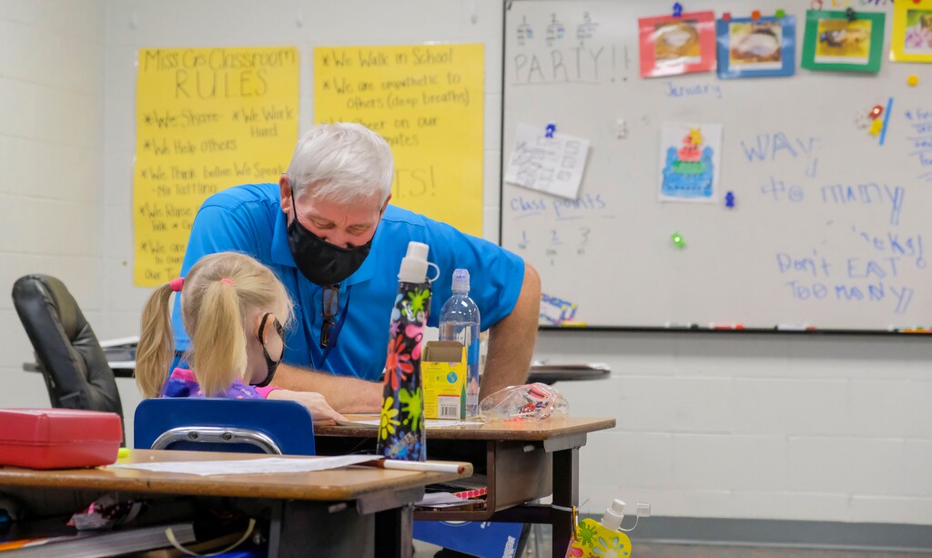 (Leah Hogsten | The Salt Lake Tribune) Jack Legge, a substitute at Northlake Elementary in the Tooele School District, teaches in this photo from 2020. Gov. Spencer Cox announced on Monday, Jan. 31, 2021, that he will now be allowing state employees to work as substitute teachers to address the staffing shortage in schools with the pandemic.