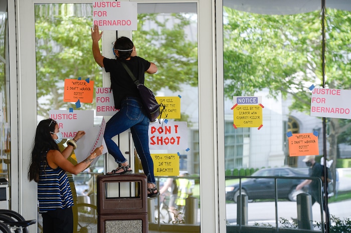 (Francisco Kjolseth  |  The Salt Lake Tribune) Demonstrators gather at the Salt Lake County District Attorney's office as they plaster the building asking for Justice for Bernardo Palacios Rally, on Thursday, June 18, 2020.