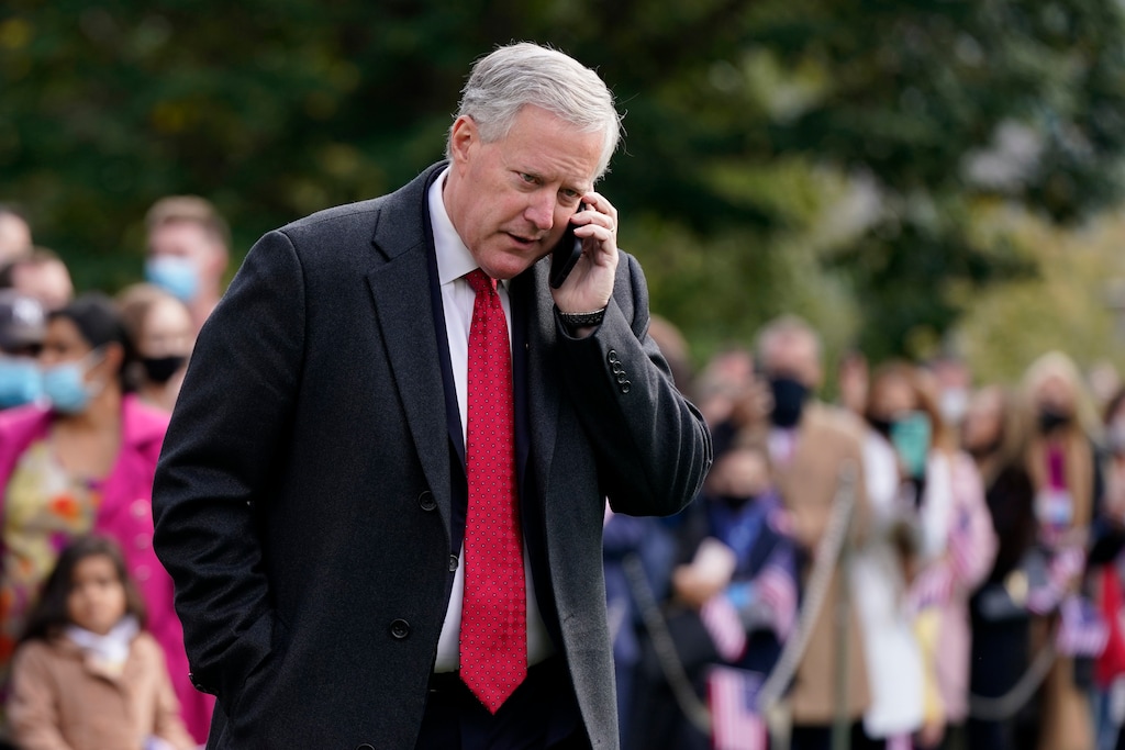 In this Oct. 30, 2020, photoWhite House chief of staff Mark Meadows speaks on a phone on the South Lawn of the White House in Washington. Meadows has been diagnosed with coronavirus.  (AP Photo/Patrick Semansky)