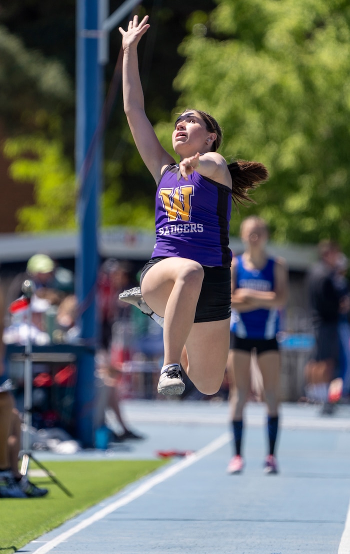 (Rick Egan | The Salt Lake Tribune)   Kailee Tohonnie competes in the 1A Girls long jump, at the State High School Championships at BYU, on Saturday, May 21, 2022.
