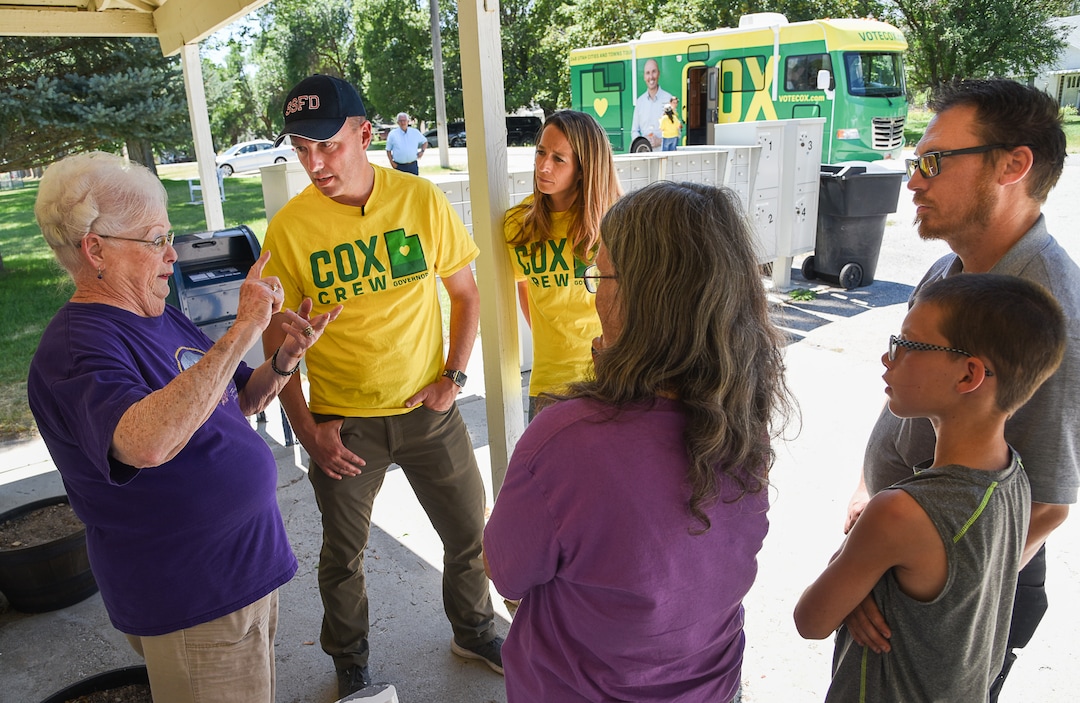 (Francisco Kjolseth  |  The Salt Lake Tribune)  Lt. Gov. Spencer Cox, and his wife Abby, center, meet with residents of the town of Portage in Box Elder County with a population of 245, including Norma Lasa, left, and Barbara Taylor alongside her grandson Nathan, 11, and her son Jesse, at right, as he attempts to visit each city and town in Utah during his gubernatorial campaign tour.