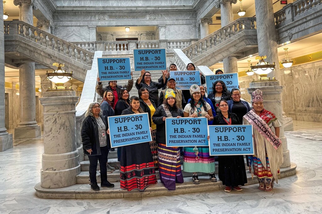 (Saige Miller | KUER) Members from some of Utah’s eight federally recognized tribes gather on the steps inside the Utah State Capitol on Feb. 21, 2025, to urge lawmakers to pass a state version of the Indian Child Welfare Act.