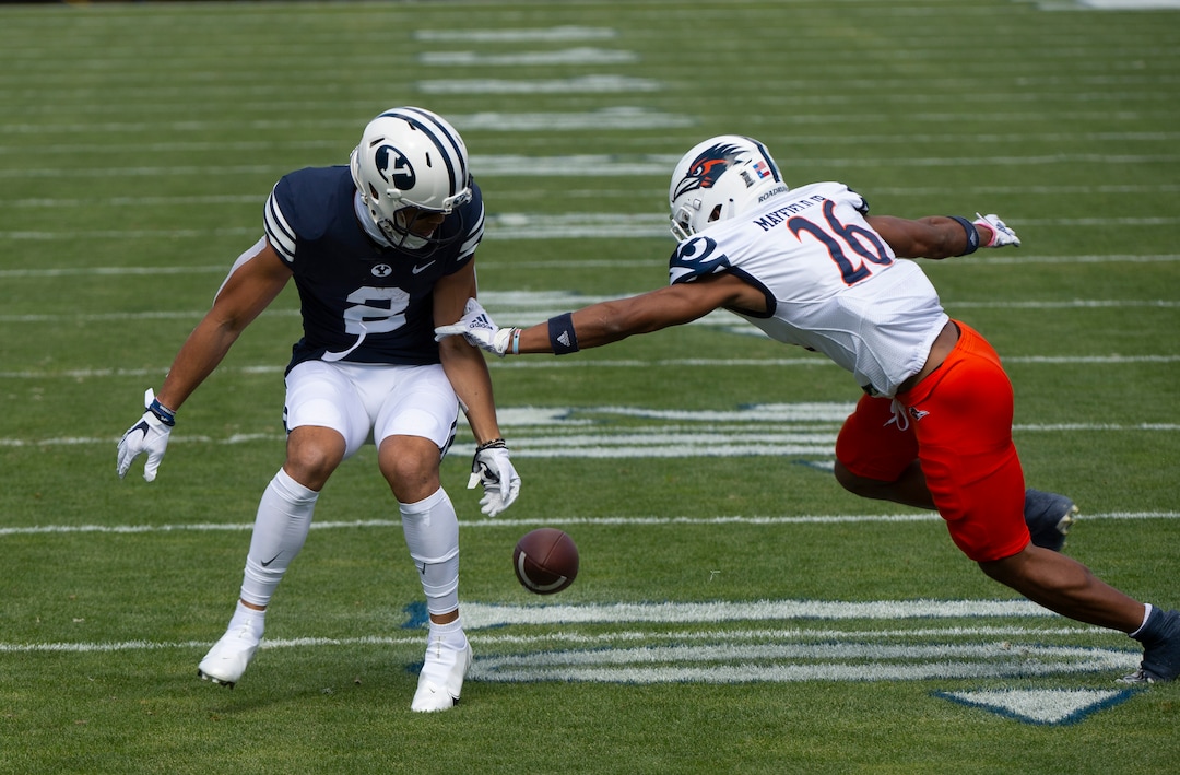 (Rick Egan  |  The Salt Lake Tribune)    Brigham Young Cougars wide receiver Neil Pau'u (2) has the ball stripped by UTSA Roadrunners cornerback Corey Mayfield Jr. (26), resulting in a fumble, in football action between the Brigham Young Cougars and the UTSA Roadrunners, at Lavell Edwards stadium, Saturday, Oct. 10, 2020.