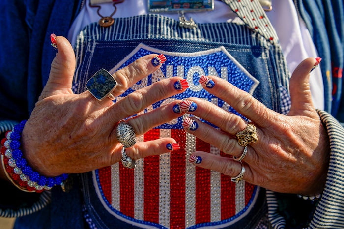 Leah Hogsten  |  The Salt Lake Tribune  Heidi McCord of Kerrville, Texas wore her patched Union Pacific overalls and did her nails for the two day event.  In celebration for the 150th anniversary of the transcontinental railroadÕs completion, Union Pacific's iconic steam locomotives, Living Legend No. 844 and Big Boy No. 4014 met at Ogden Union Station, May 9, 2019.