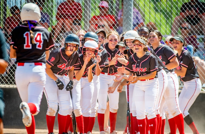 (Isaac Hale | Special to The Tribune) Spanish Fork pitcher Peyton Hall (14) makes her way to home plate as her teammates await her to celebrate her home run during the second game of a best-of-three series between the Spanish Fork Lady Dons and the Mountain Ridge Sentinels as part of the 5A state softball championship held at the Spanish Fork Sports Park on Friday, May 28, 2021.