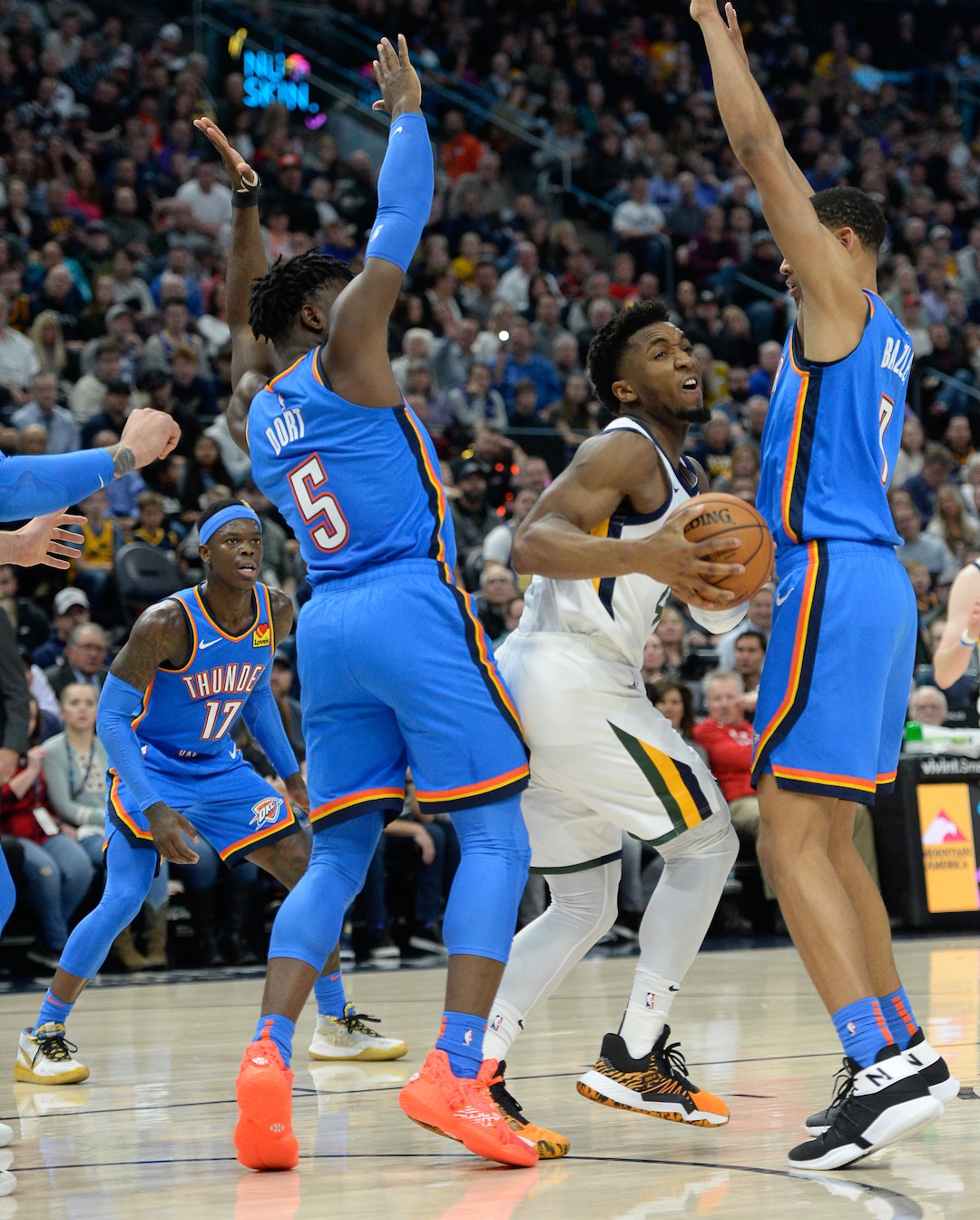 (Francisco Kjolseth  |  The Salt Lake Tribune)  Utah Jazz guard Donovan Mitchell (45) is pressured as the Utah Jazz host the Oklahoma City Thunder in their NBA basketball game at Vivint Smart Home Arena in Salt Lake City on Mon. Dec. 9, 2019.