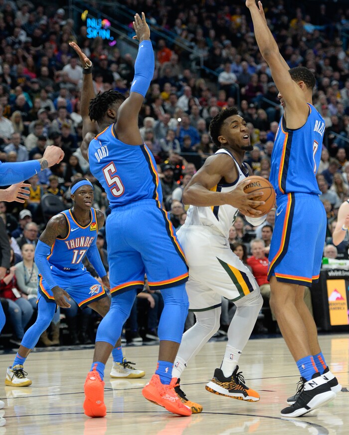 (Francisco Kjolseth  |  The Salt Lake Tribune)  Utah Jazz guard Donovan Mitchell (45) is pressured as the Utah Jazz host the Oklahoma City Thunder in their NBA basketball game at Vivint Smart Home Arena in Salt Lake City on Mon. Dec. 9, 2019.