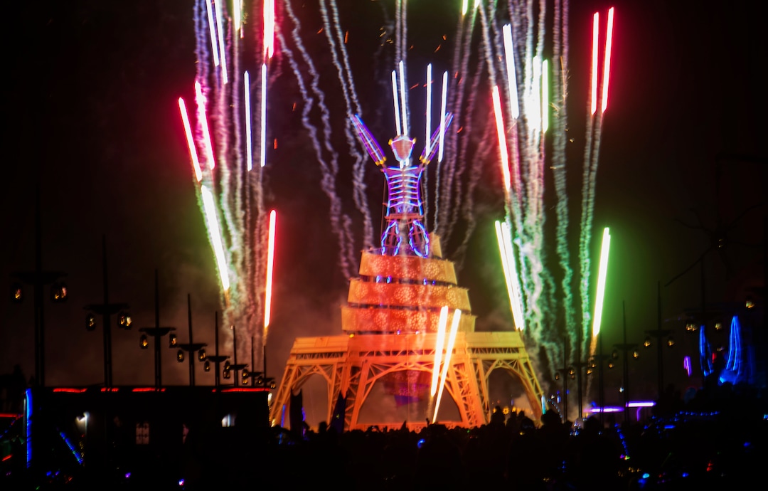 (Rick Egan  |  The Salt Lake Tribune)   Fireworks explode around the man before he burns, Saturday night, at Burning Man, in the Black Rock Desert,  north of Reno, Nevada. The Art Theme this year is Metamorphoses. Saturday, Aug. 31, 2019.