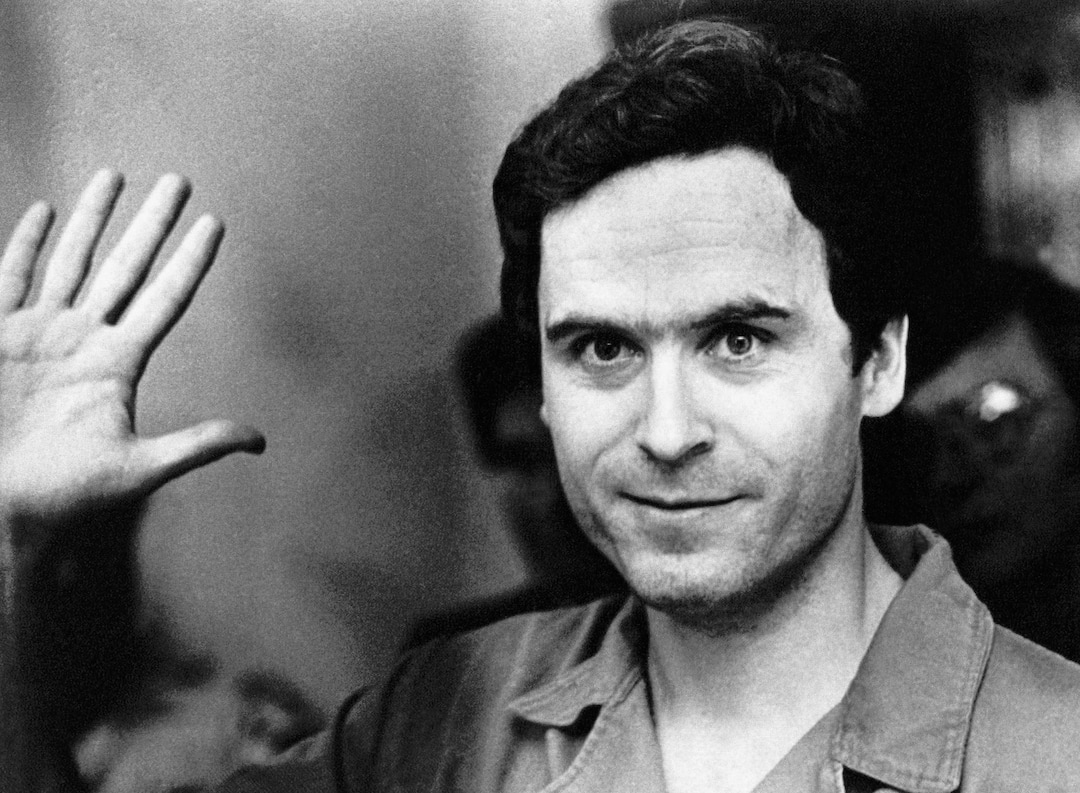 (Associated Press file photo) Ted Bundy mugs for the media after Leon County, Florida, Sheriff Ken Katsaris informed him of his indictment by a grand jury on July 28, 1978. Bundy was indicted on two counts of first-degree murder; three counts of attempted murder; and two counts of burglary in the slayings of and attacks on Florida State University students in the Chi Omega sorority. He was executed in Florida on Jan. 24, 1989.
