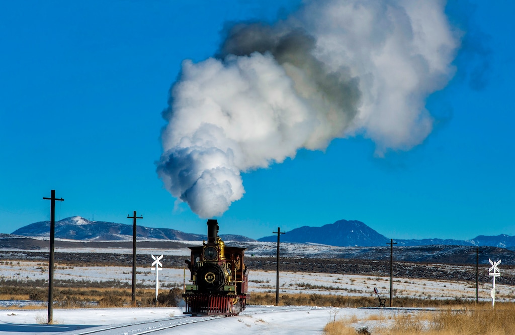 (Rick Egan | The Salt Lake Tribune) The 119 Steam Engine chugs down the track at the Golden Spike National Historical Park during one of the winter steam locomotive demonstrations, on Tuesday, Dec. 29, 2020.