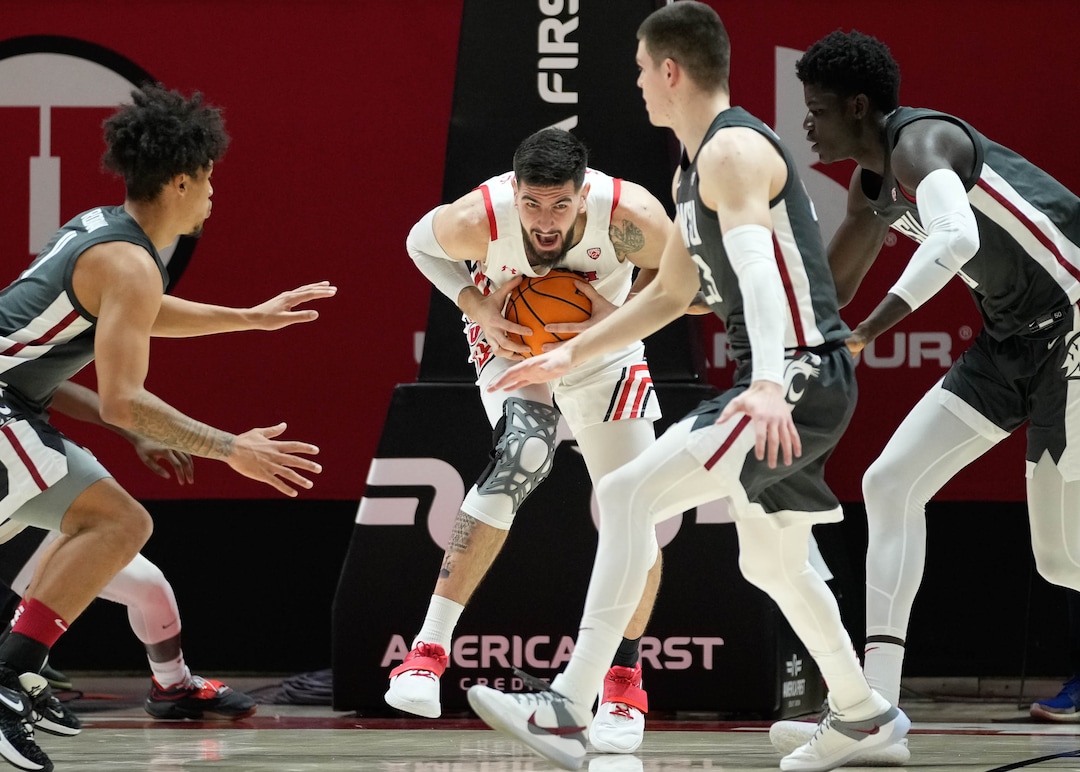 (Francisco Kjolseth | The Salt Lake Tribune) Utah Utes forward Dusan Mahorcic (21) pulls down a rebound in game action against the Washington State Cougars at the Jon M.Huntsman Center, on Saturday, Jan. 8, 2022. Utah lost 61-77.