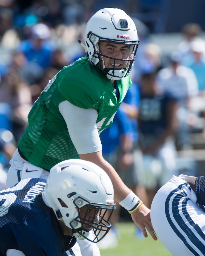 (Rick Egan  |  The Salt Lake Tribune) BYU quarterback, Tanner Mangum (12) runs the offense, during the BYU Cougars public scrimmage at Lavell Edwards Stadium, Thursday, August 17, 2017.
